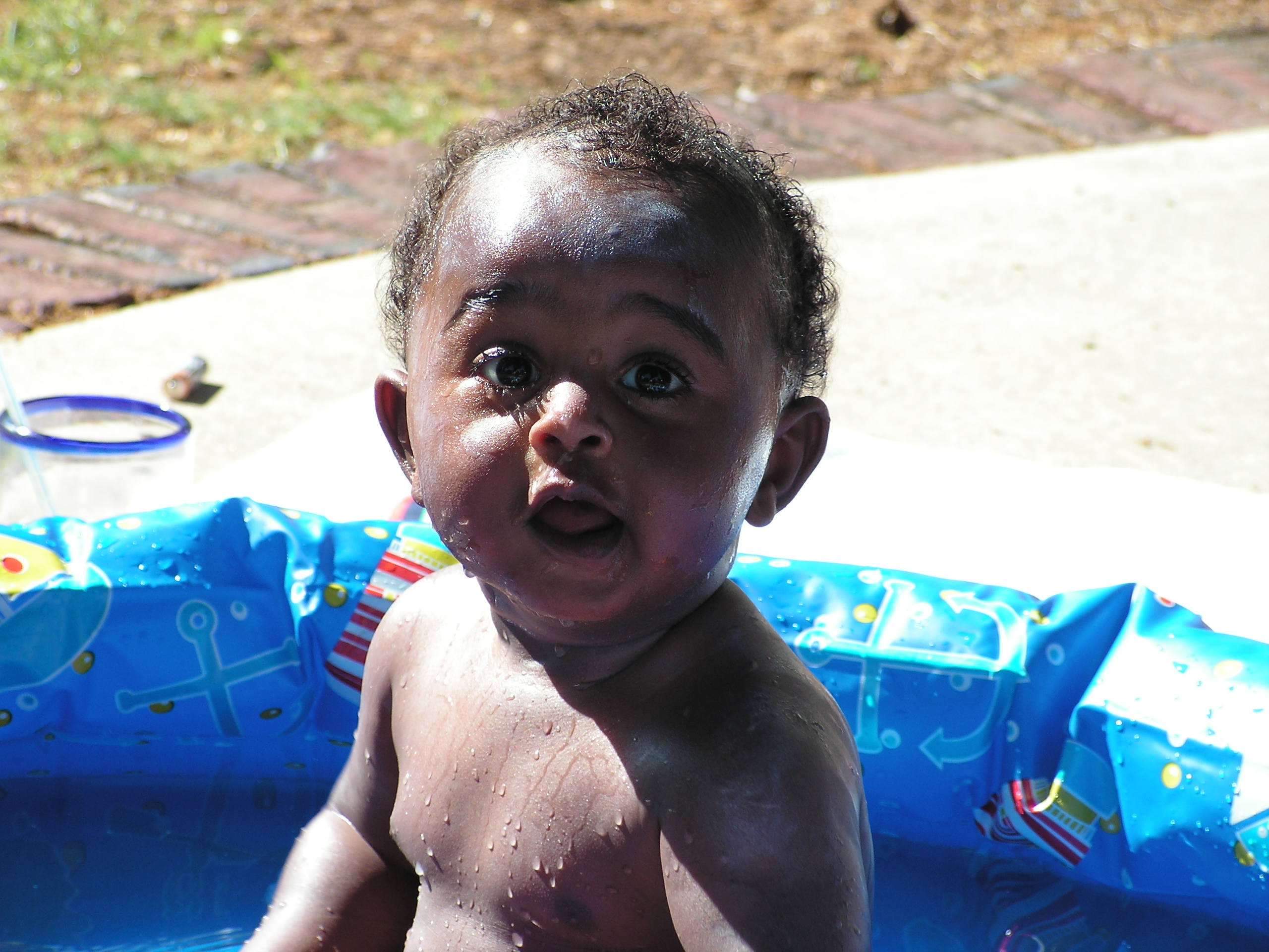 baby in pool head-on