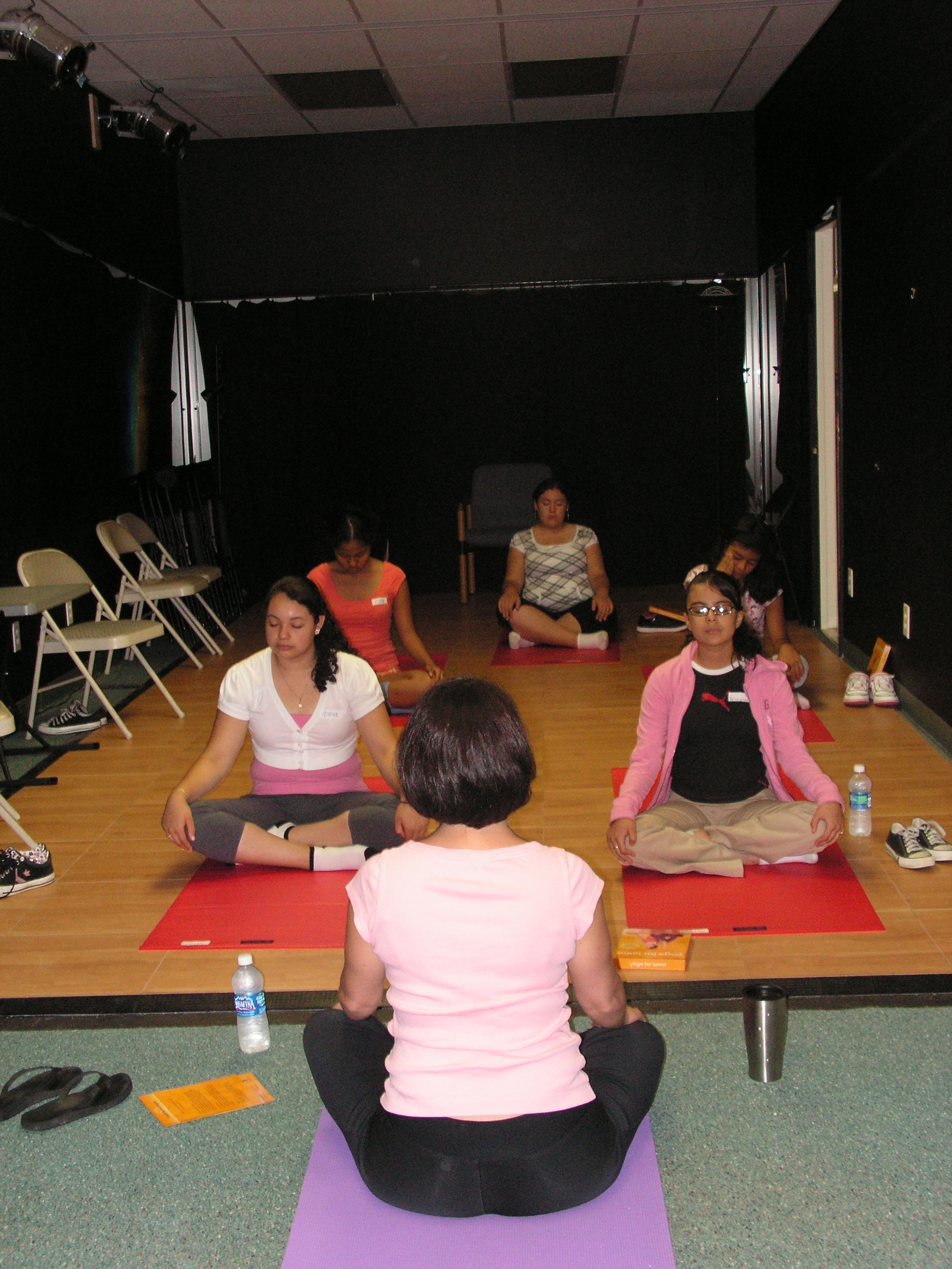 Some of the Circle de Luz girls give yoga a try.  
