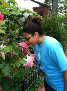 Katie stops and smells the roses during Run Big Dream Big IV. 